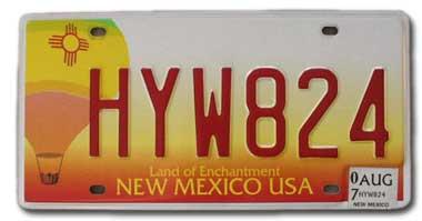 Red and yellow New Mexico license plate featuring hot air balloon