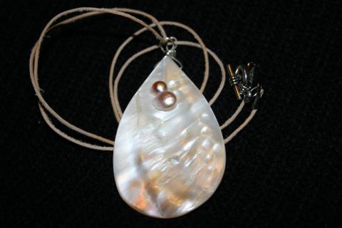 Cabochon cut oyster shell pendant Cabochon cut oyster shell pendant