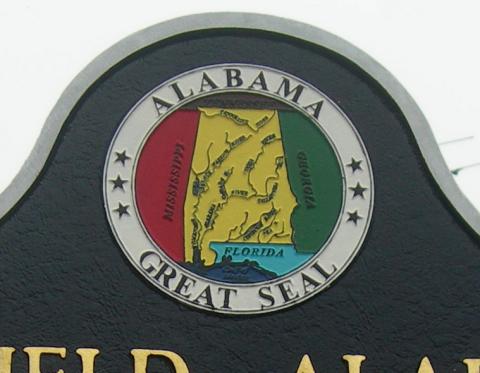 Emblem on Alabama historic marker Emblem on Alabama historic marker