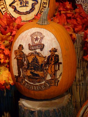 Maine seal carved on a pumpkin Pumpkin carving of Maine state seal
