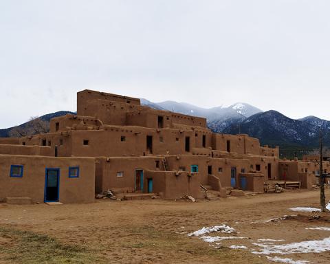 Taos Pueblo with the Sangre de Cristo Mountains in the background.
