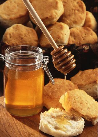Honey dripping on biscuits