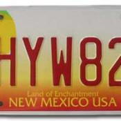 Red and yellow New Mexico license plate featuring hot air balloon