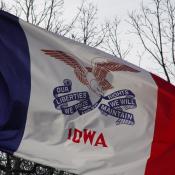 Iowa state motto on the flag of Iowa