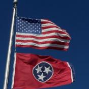 Tennessee and U.S. flags waving